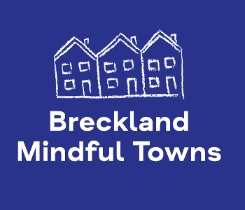 Three white hand-drawn houses on a blue background and wording Breckland Mindful Towns